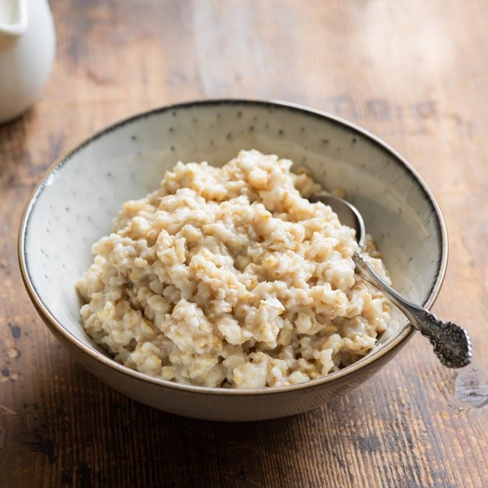 Oatmeal porridge in bowl for healthy breakfast