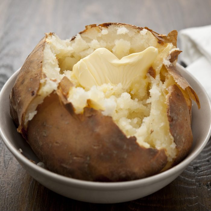 Baked potato with melting butter