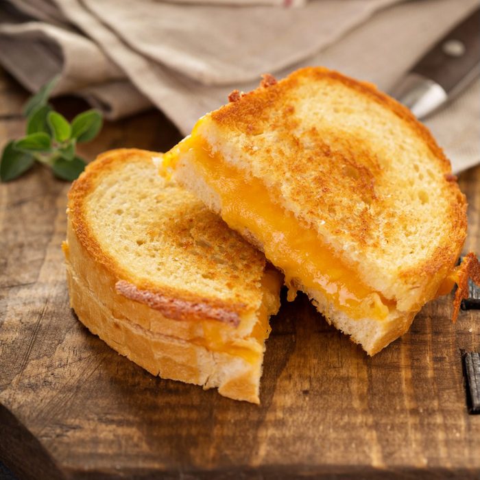 Grilled cheese sandwiches with white bread and cheddar
