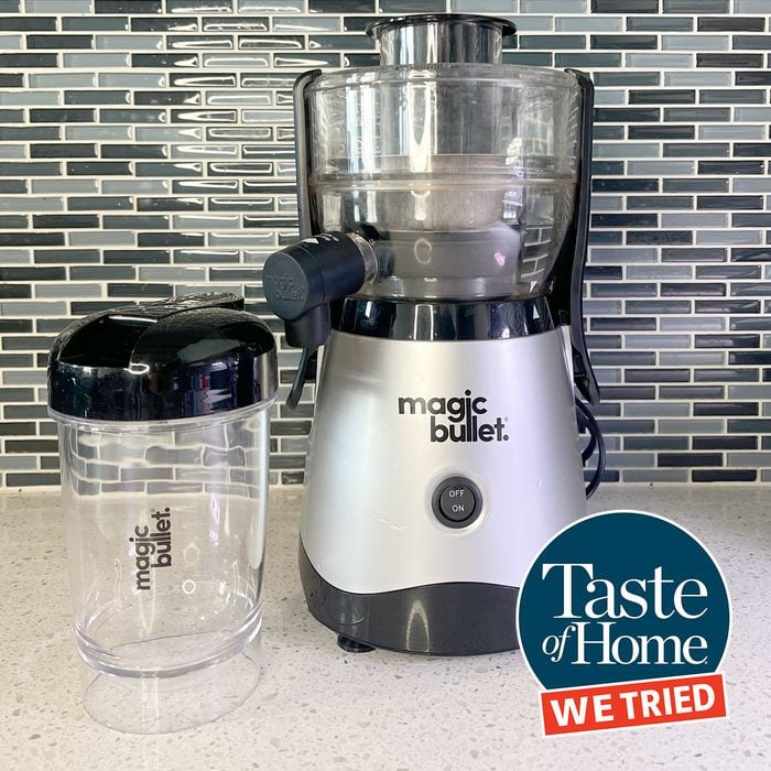 magic bullet juicer on a kitchen counter with the taste of home we tried logo
