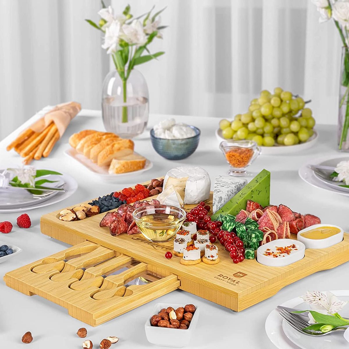 https://www.tasteofhome.com/wp-content/uploads/2022/10/Unique-Bamboo-Cheese_Board_ecomm-amazon.com_.jpg?fit=700%2C700