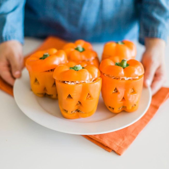 Jack O Lantern Stuffed Bell Peppers on a plate