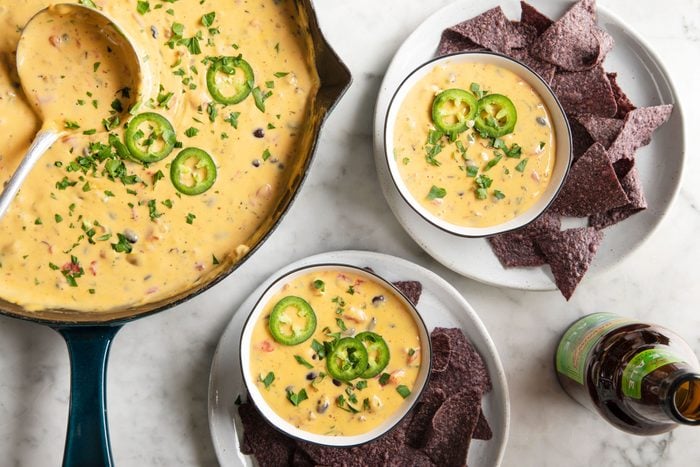 Cowboy Queso in bowls with taco chips on the side