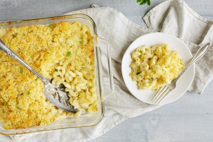Ina Garten Overnight Mac and Cheese Finished in Square Dish with Serving Spoon