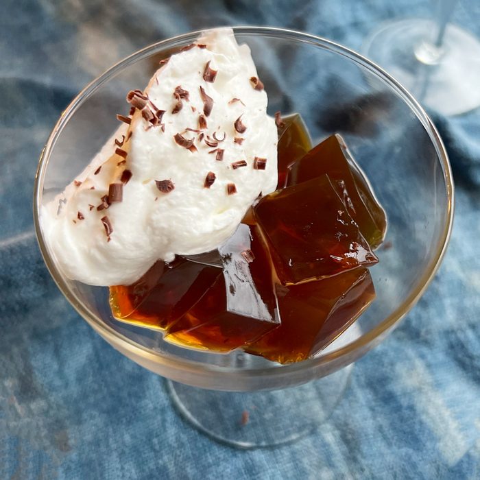 coffee jelly in a glass with whipped cream