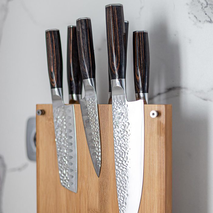 https://www.tasteofhome.com/wp-content/uploads/2022/12/GettyImages-1391432872-DH-TOH-Resize-Damascus-Knives-Best-For-Your-Kitchen-SOCIAL.jpg?fit=700%2C1024