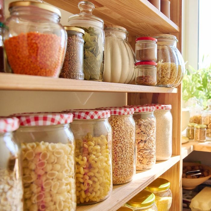 Food Stored in Kitchen Pantry with light shining through window