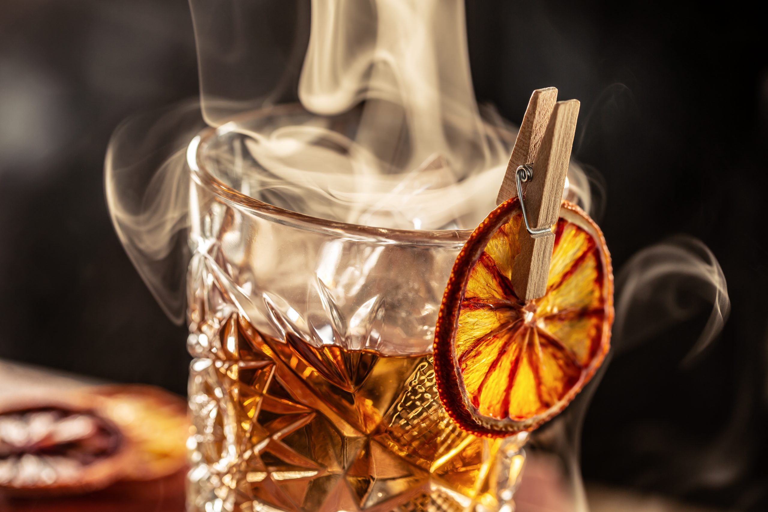 Glass of bourbon over smoked ice cubes garnished with smoked oranges. It's  1700 somewhere : r/Traeger