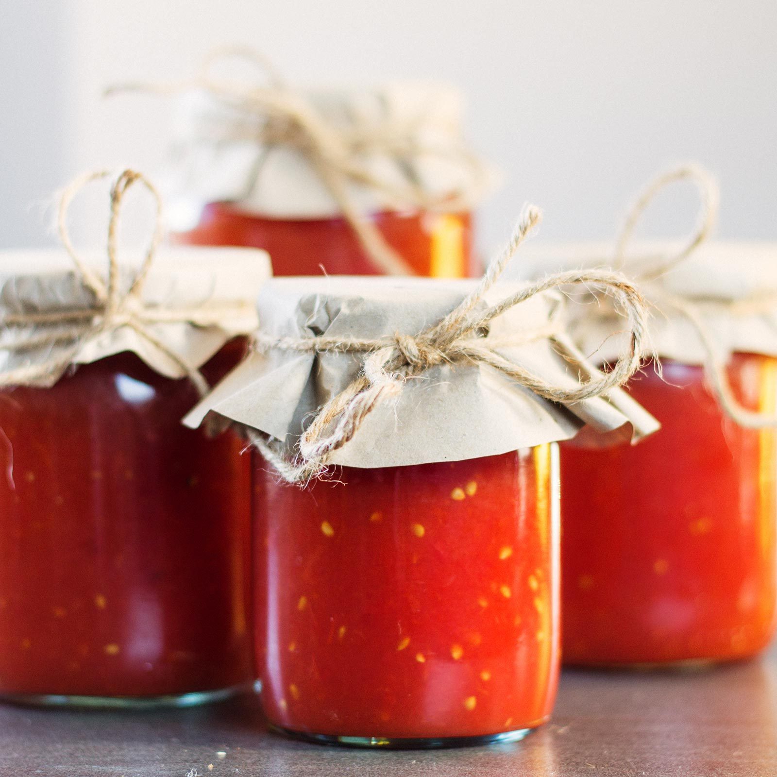 Homemade Tomato Paste In Jars with shallow focus