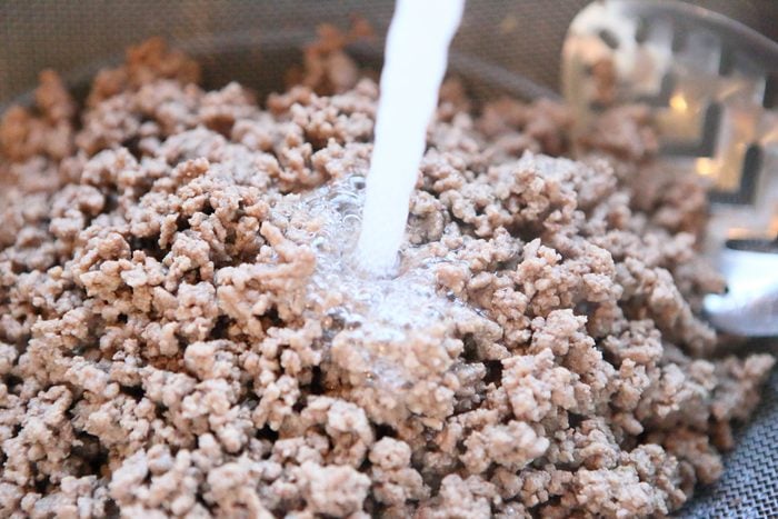 Rinsing cooked ground beef With Water