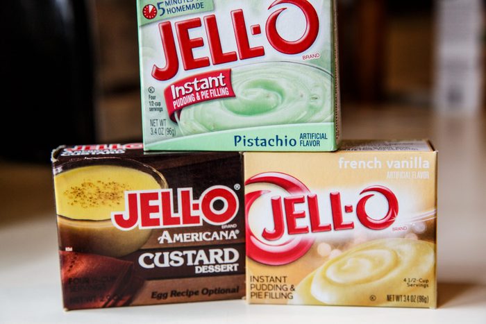 Kraft Jell-O Products stacked on a shelf in a home kitchen