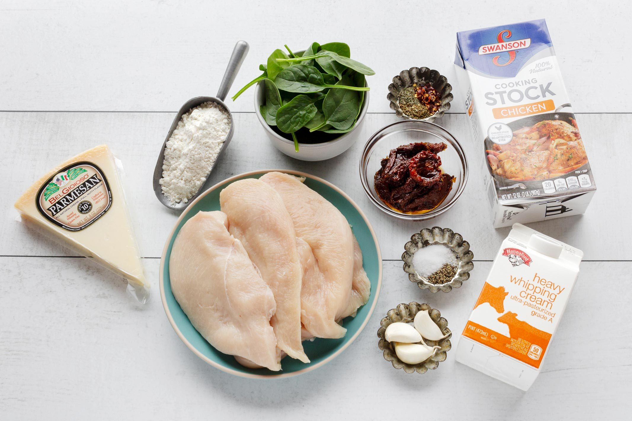ingredients to make Mary me chicken on a white wooden surface
