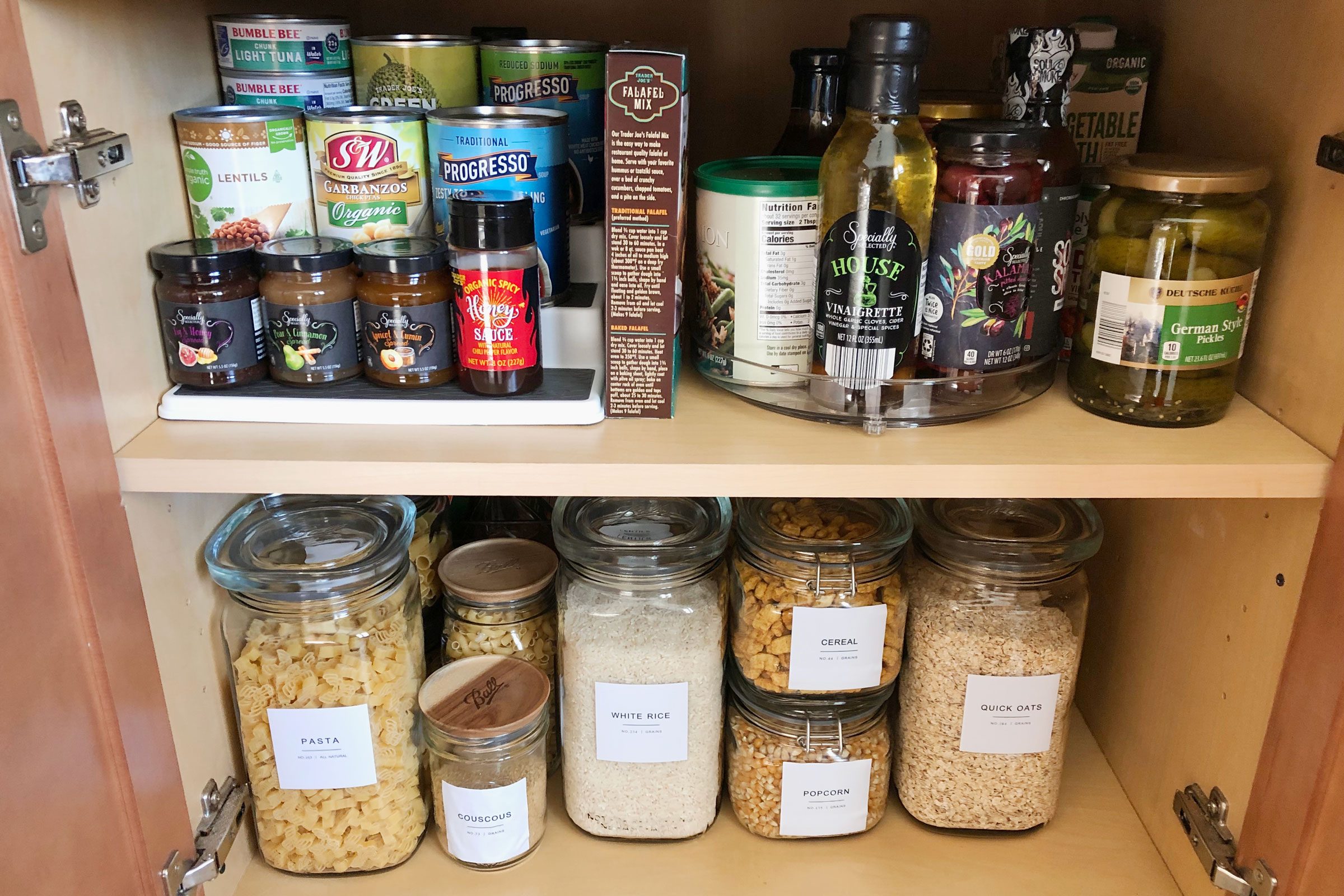 pantry organized with ball jars and labels