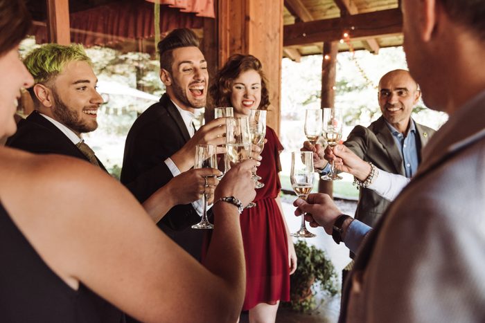 champagne toasting celebration at the gay wedding