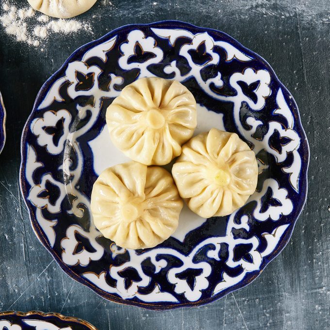 three Momos on a plate