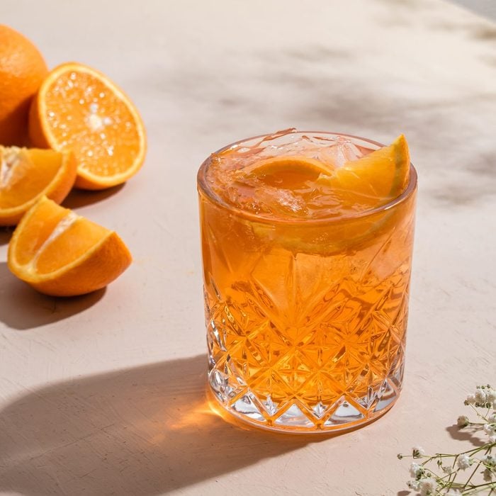 whiskey cocktail with orange slice