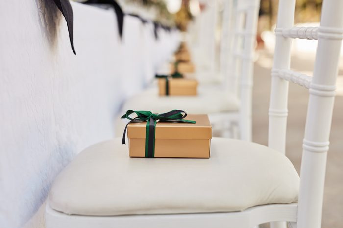 Shot of a gift box on a chair at a wedding reception