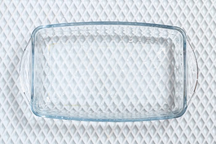 A baking dish cleaned from thick layer of carbon. Glassware for baking after washing with a steam cleaner.