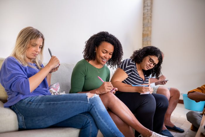 Friends playing leisure games at home