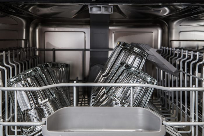 Transparent glasses into modern dishwasher machine