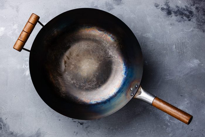 Wok pan with wooden handle