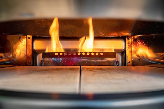 close up of the flame in a solo stove pizza oven