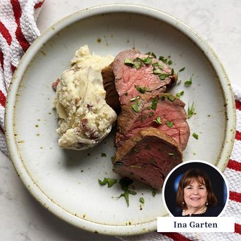 Ina Garten Beef Tenderloin on a plate with mashed potatoes