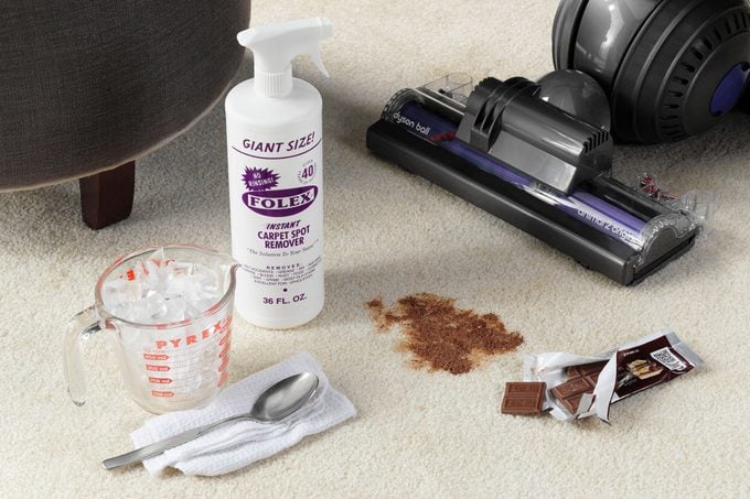 chocolate stain on a carpet With Cleaners And A Dyson Vacuum