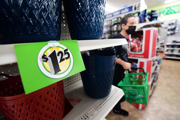 Sign displays $1.25 Price Tag on the shelves of a Dollar Tree