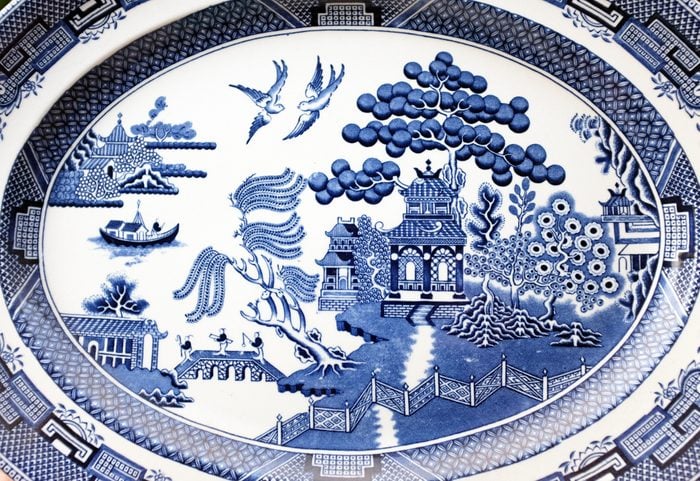 Traditional willow pattern design on antique Victorian serving platter