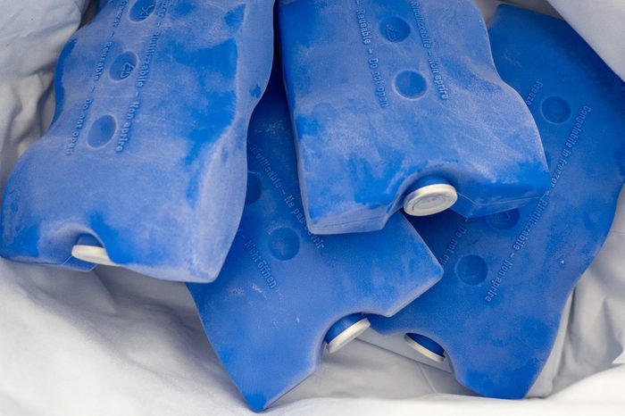 Four blue freezer packs in a cool bag