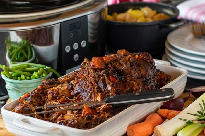Slow cooker dish with roast pork