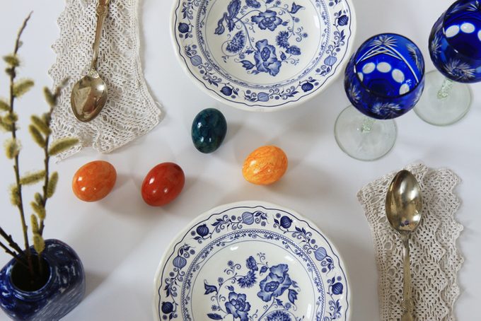 Two Empty China Soup Plates are set out for an Easter table setting