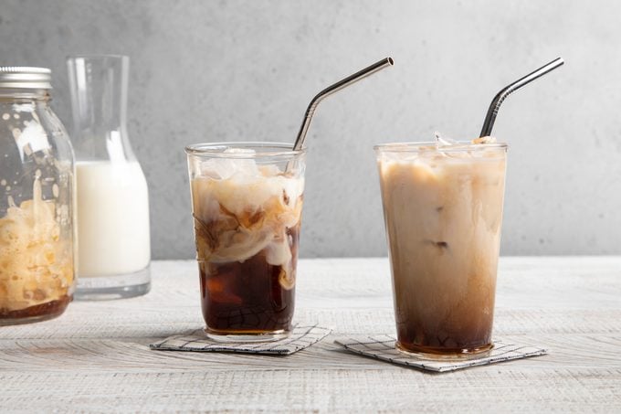 two Starbucks shaken espresso in clear glasses with metal straws