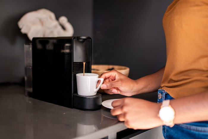 hands making coffee in the morning