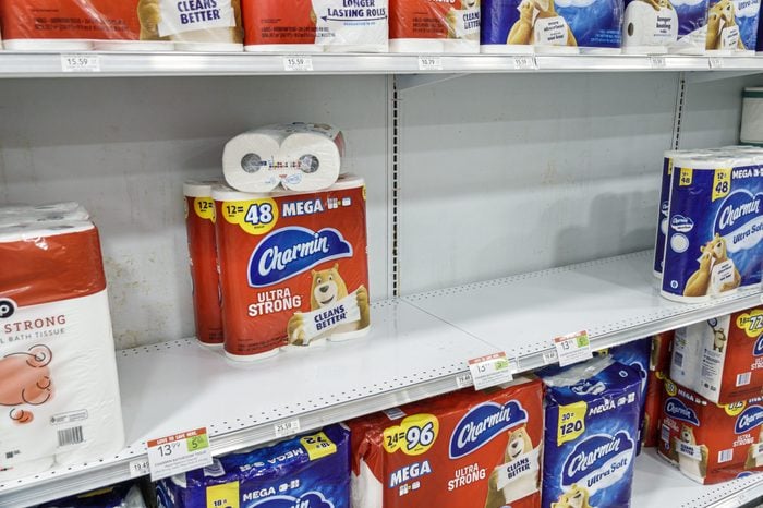 Charmin paper towels and empty shelves at a grocery store