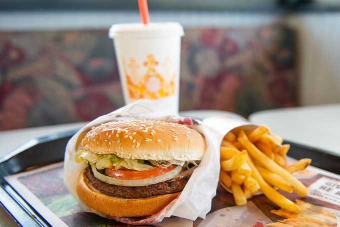 an 'Impossible Whopper' sits on a table at a Burger King restaurant