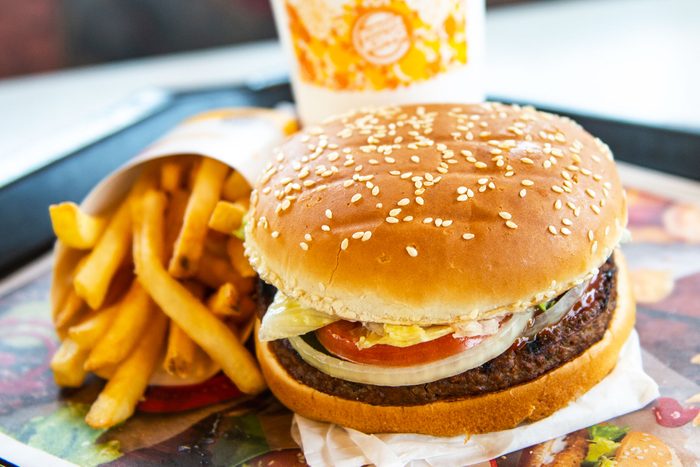 an 'Impossible Whopper' combo meal sits on a table at a Burger King restaurant