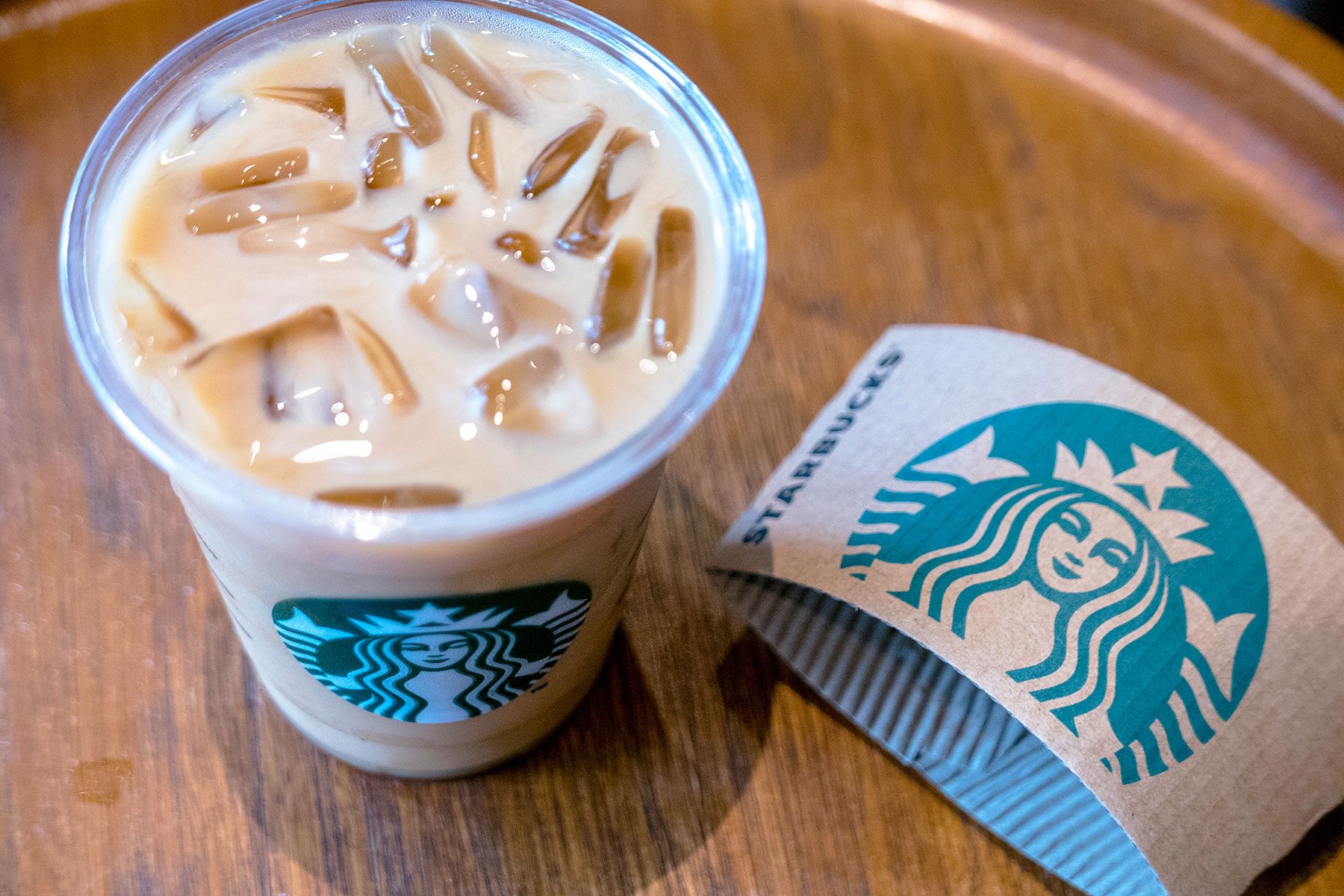 A Cup Of Icy Starbuck Coffee Logo On A Cup Of Starbuck