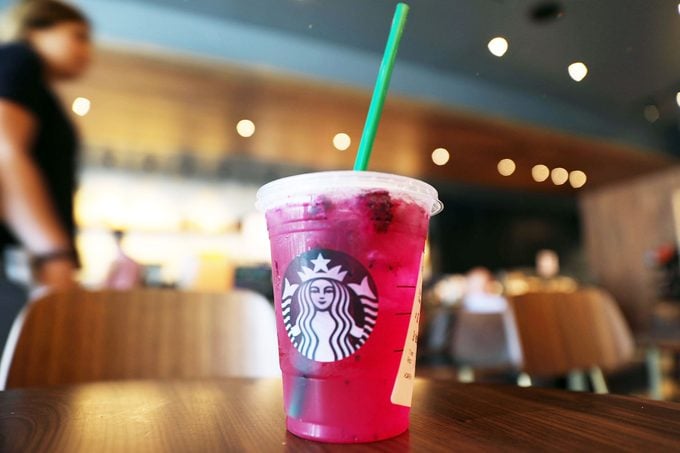 A plastic straw is seen in a Starbucks drink on July 9, 2018 in Miami, Florida