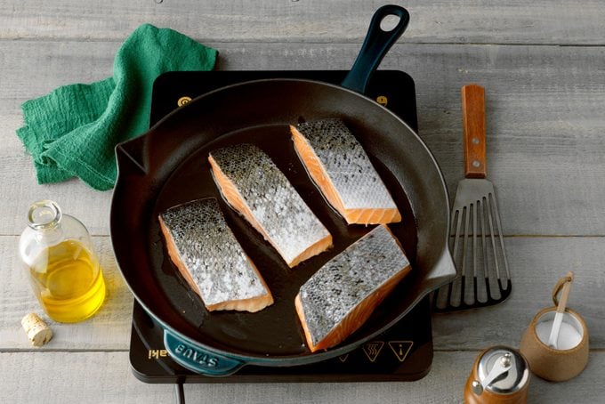 Salmon Skin Side Up Cooking In Electric Skillet
