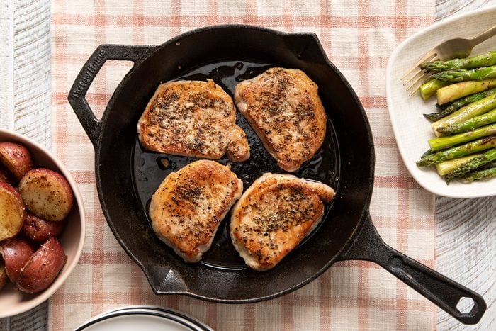 Pan Seared Pork Chops in a cast iron skillet