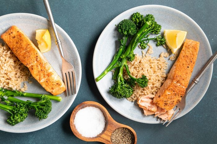 Fully prepared Air Fryer Salmon served with brown rice and vegetables