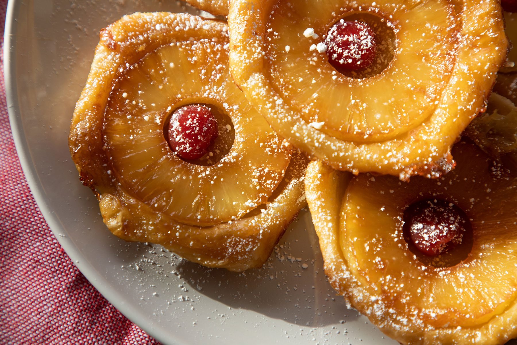 https://www.tasteofhome.com/wp-content/uploads/2023/06/Close-Up-Pineapple-Upside-Down-Pastries-Adrienne-Pen%CC%83a-for-TOH-Resize-DH-TOH.jpg