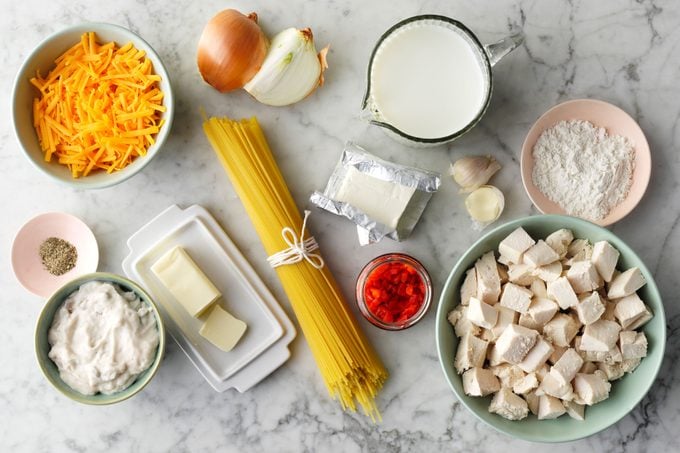 Chicken Spaghetti ingredients laid out on marble surface