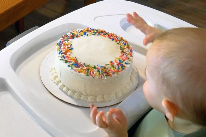 Smash Cake About To Be Smashed By Toddler