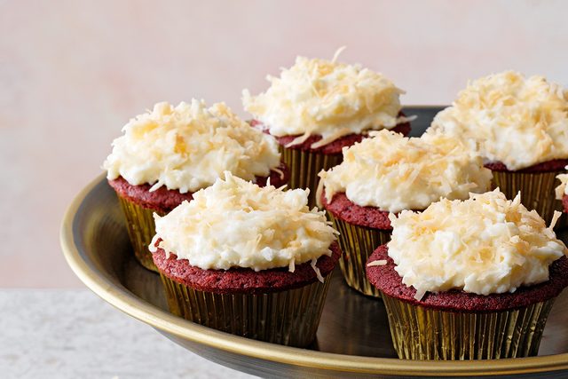 Red velvet cupcakes with coconut frosting