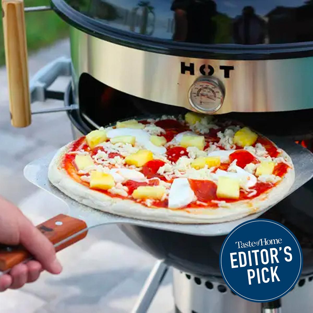 https://www.tasteofhome.com/wp-content/uploads/2023/06/This-Genius-Kit-Turns-Your-Kettle-Grill-Into-a-Pizza-Oven_FT_via-amazon.com_1.jpg
