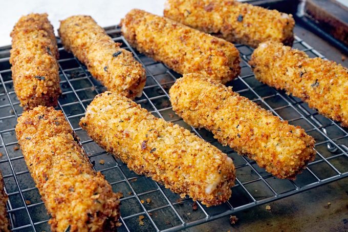 Mozzarella Sticks on a cooling rack