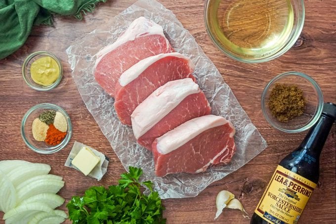 Ingredients for Instant Pot Pork Chops on Wooden Surface